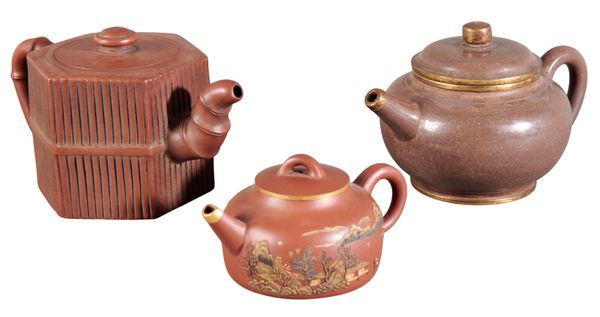 A GROUP OF THREE CHINESE YIXING TEAPOTS