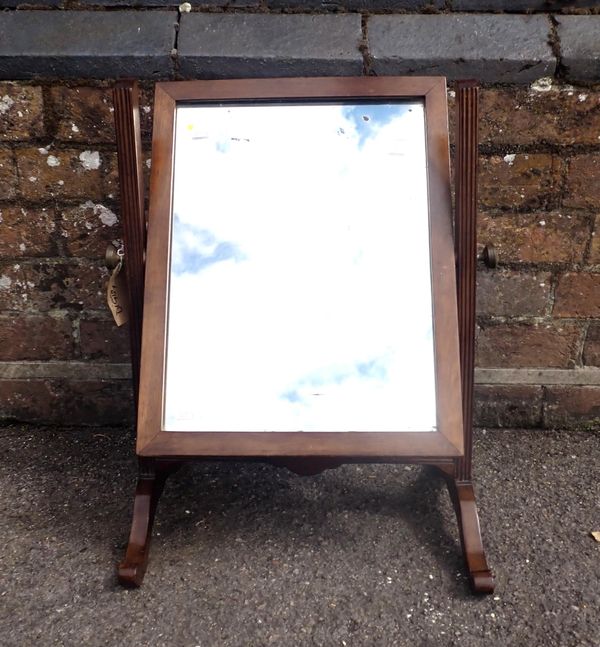 A MAHOGANY FRAMED TOILET MIRROR