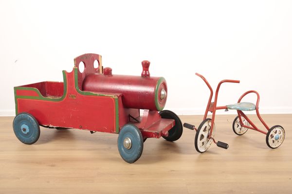 A PLYWOOD 'LEEWAY FLYER' PEDAL CAR  MODELLED AS A TRAIN LOCOMOTIVE BY 'PATTERSON EDWARDS LTD.'
