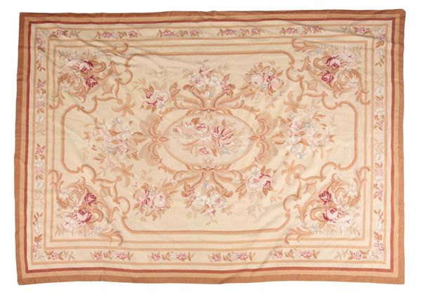 A NEEDLEPOINT RUG OF AUBUSSON DESIGN