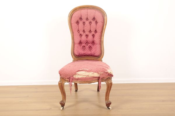 A VICTORIAN WALNUT NURSING CHAIR