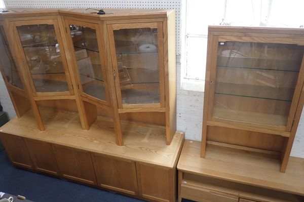 A MODERN PALE OAK AND ASH DISPLAY CABINET