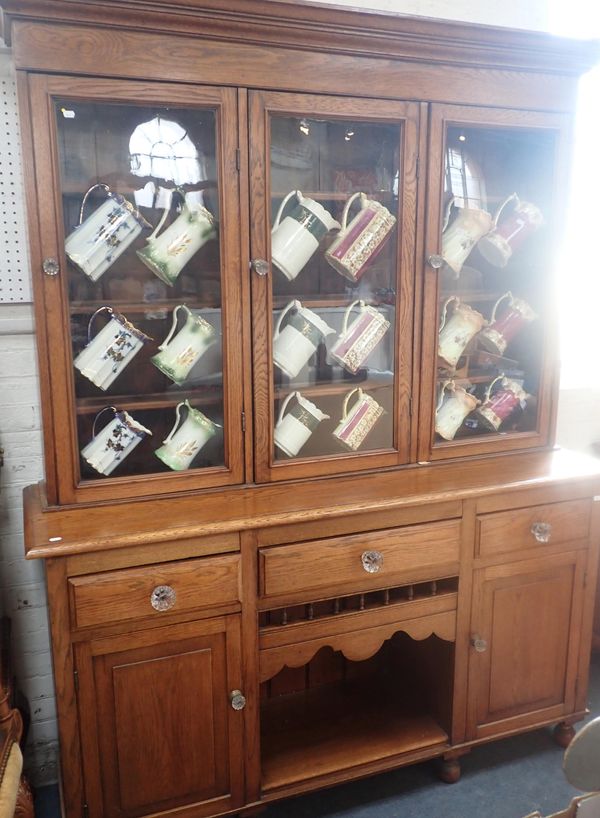 A VICTORIAN WELSH GOLDEN OAK GLAZED KITCHEN DRESSER