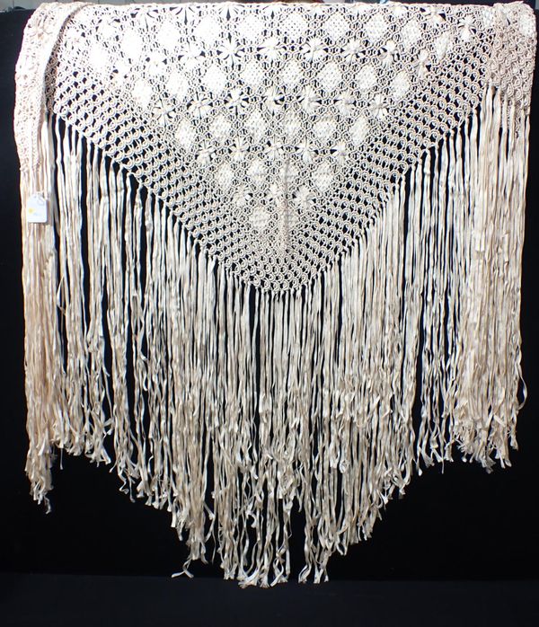 A SHAWL, WOVEN OF FLAT TAPES