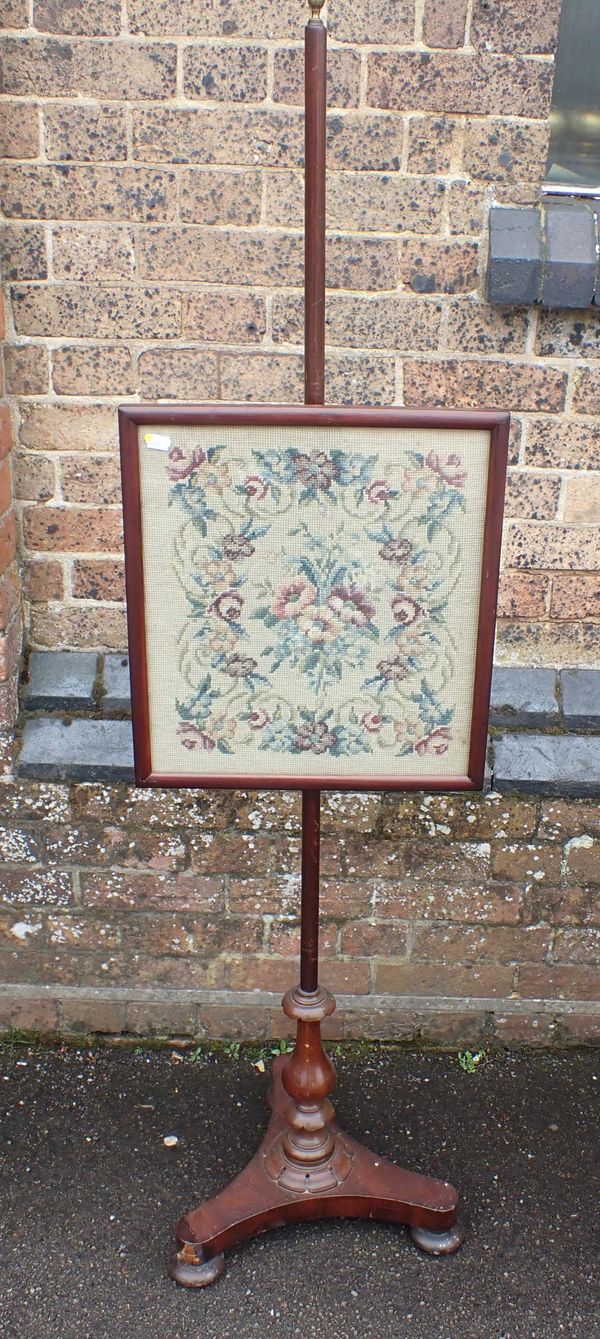 A 19th CENTURY MAHOGANY POLE SCREEN