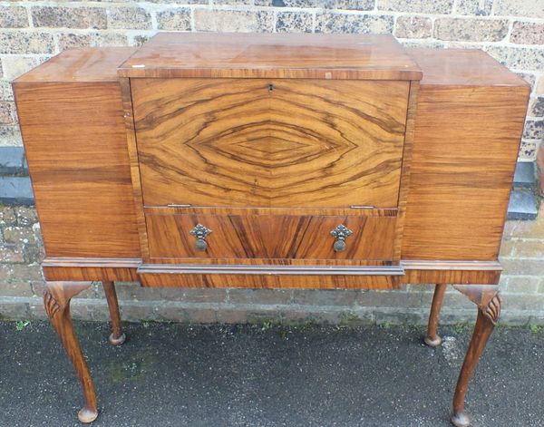 A 1930s WALNUT BUREAU/DRINKS CABINET