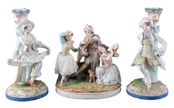 A CONTINENTAL BISQUE PORCELAIN FIGURAL GROUP