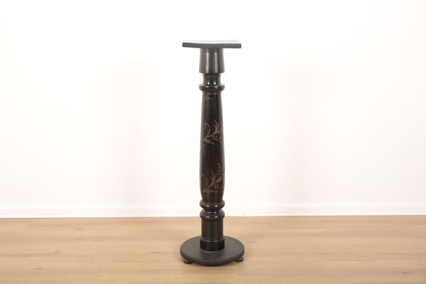 AN EBONISED WOOD COLUMNAR JARDINIERE STAND