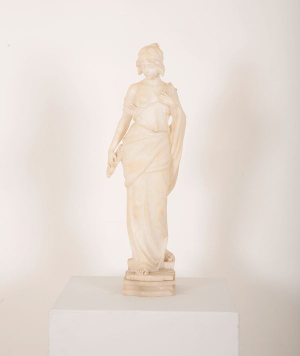 A CARVED ALABASTER FIGURE OF A CLASSICAL MAIDEN