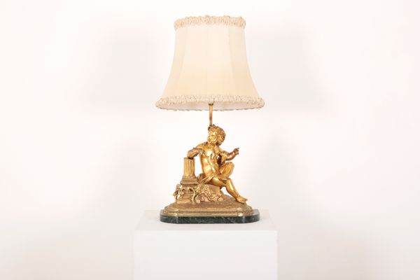 AN ORMOLU PUTTI LAMP