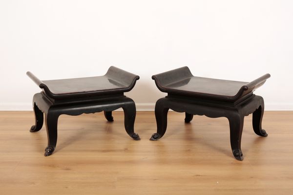 A PAIR OF ART DECO EBONISED SIDE TABLES OR STOOLS