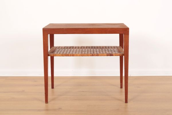 A TWO TIER TEAK COFFEE TABLE DESIGNED BY SEVERIN HANSEN, MANUFACTURED BY HASLEV