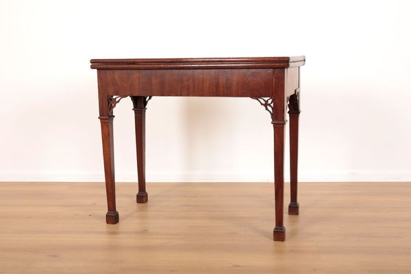 A GEORGE III MAHOGANY GAMING TABLE