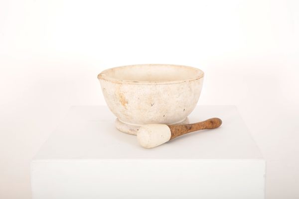 A LARGE PESTLE AND MORTAR BY WEDGEWOOD