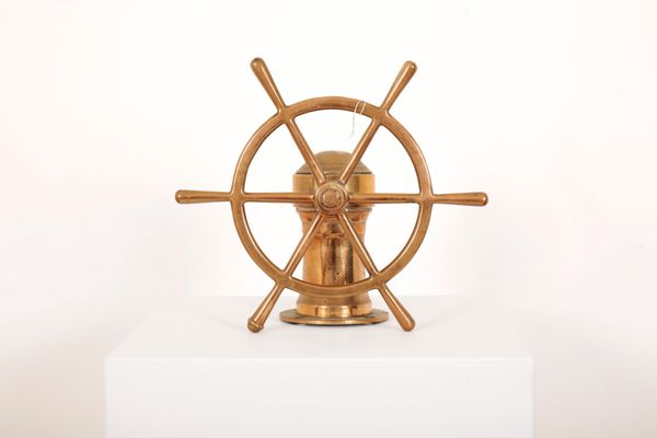 A SOLID BRASS YACHT OR STEAMBOAT WHEEL