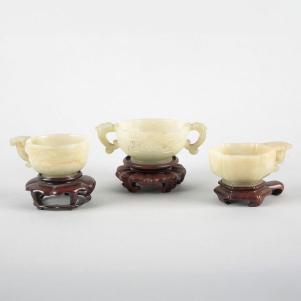 A CHINESE JADE TWO-HANDLED CUP