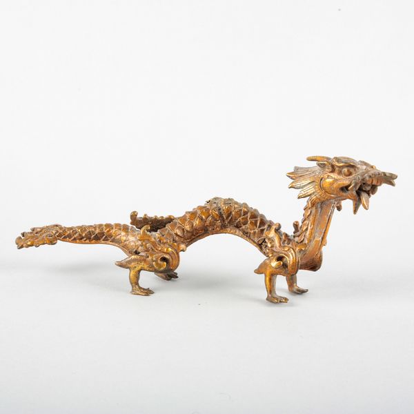 A GILT-METAL CHINESE DRAGON