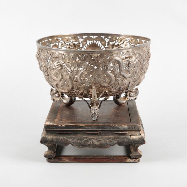A CHINESE PIERCED SILVER BOWL BY WANG HIN & CO