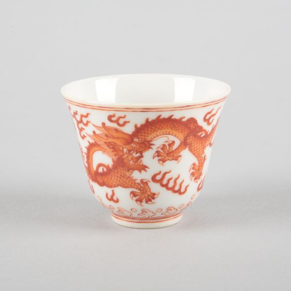 A CHINESE PORCELAIN IRON RED 'DRAGON' CUP