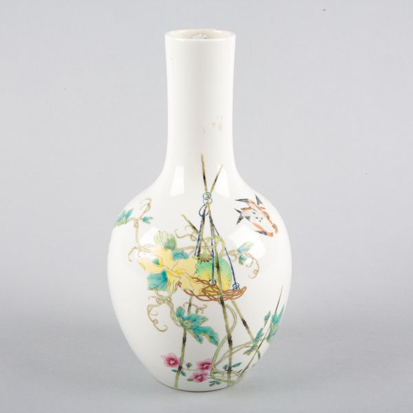 A CHINESE FAMILLE ROSE BOTTLE VASE