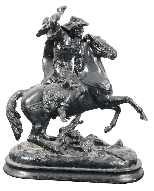 CONTINENTAL SCHOOL, 20TH CENTURY A black painted spelter figure of horse and rider