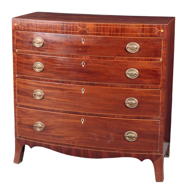 A REGENCY MAHOGANY BOW FRONT CHEST OF DRAWERS