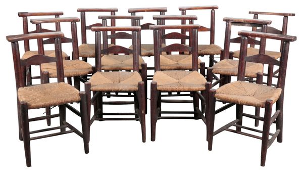 A SET OF THIRTEEN BEECH SIDE CHAIRS