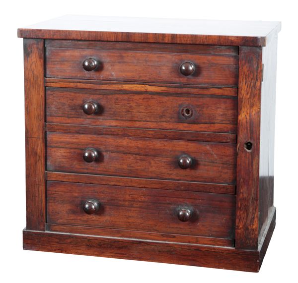 AN EARLY VICTORIAN ROSEWOOD MINIATURE WELLINGTON CHEST