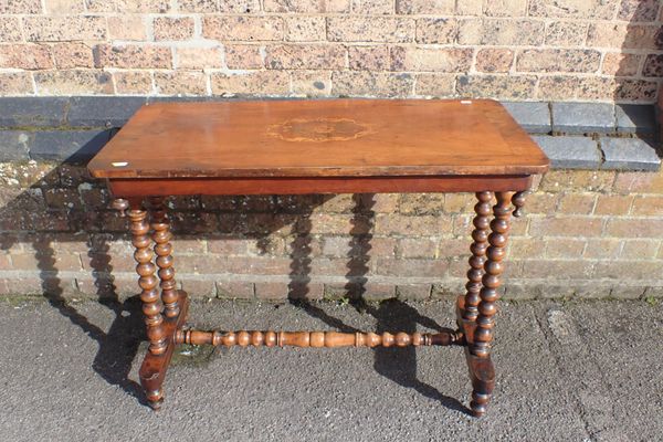 A VICTORIAN WALNUT CENTRE TABLE