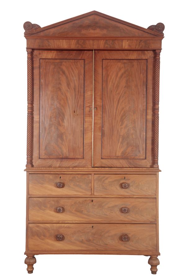 A GEORGE IV FIGURED MAHOGANY LINEN PRESS