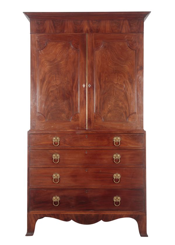 A GEORGE III FIGURED MAHOGANY LINEN PRESS