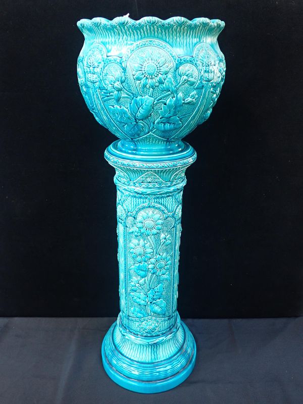 A BURMANTOFTS FAIENCE JARDINIERE AND STAND