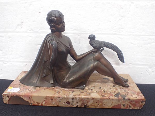 AN ART DECO BRONZED SPELTER FIGURE