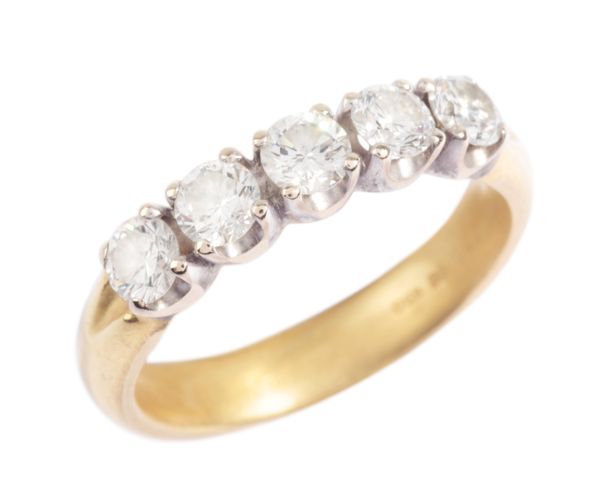 A DIAMOND FIVE STONE RING