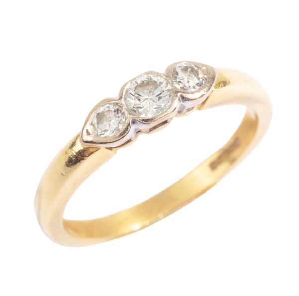 A DIAMOND THREE STONE RING