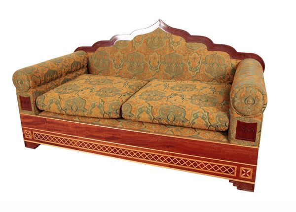 A HARDWOOD FRAMED TWO-SEATER SOFA WITH ARCHED MORESQUE BACK RAILS