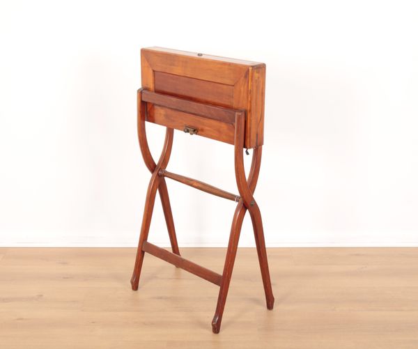 AN 'X FRAME' FOLDABLE MAHOGANY CAMPAIGN STYLE DESK