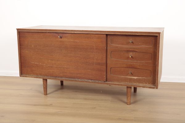 A MID CENTURY WHITE & NEWTON TEAK SIDEBOARD