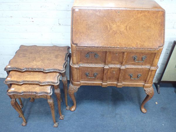 A GEORGE II STYLE WALNUT NEST OF TABLES