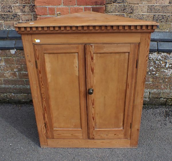 A SMALL PINE CORNER CUPBOARD