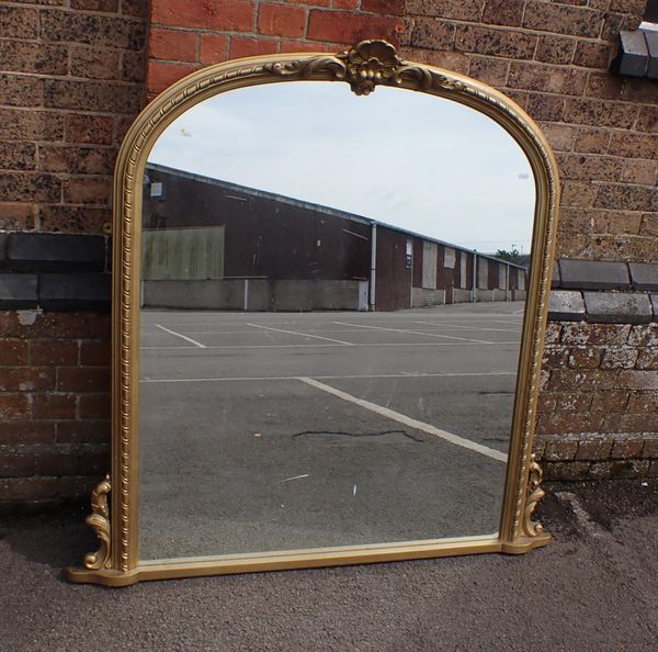 A VICTORIAN STYLE GILTWOOD OVERMANTEL MIRROR