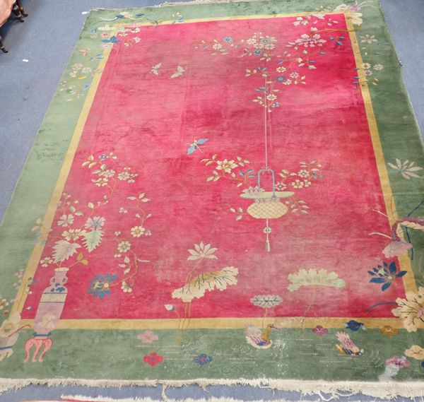 A LARGE CHINESE CARPET, CIRCA 1930