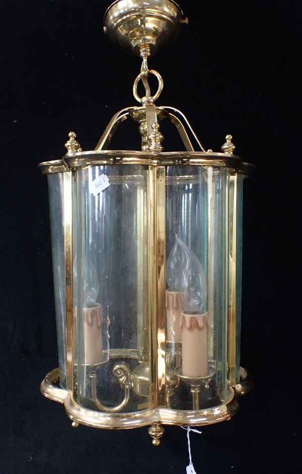 A BRASS-FRAMED HALL LANTERN