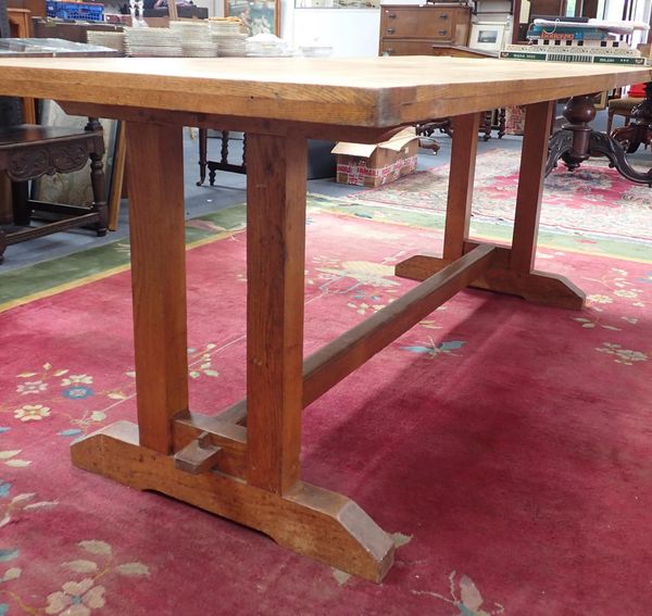 A LIGHT OAK REFECTORY TABLE, IN THE COTSWOLD STYLE