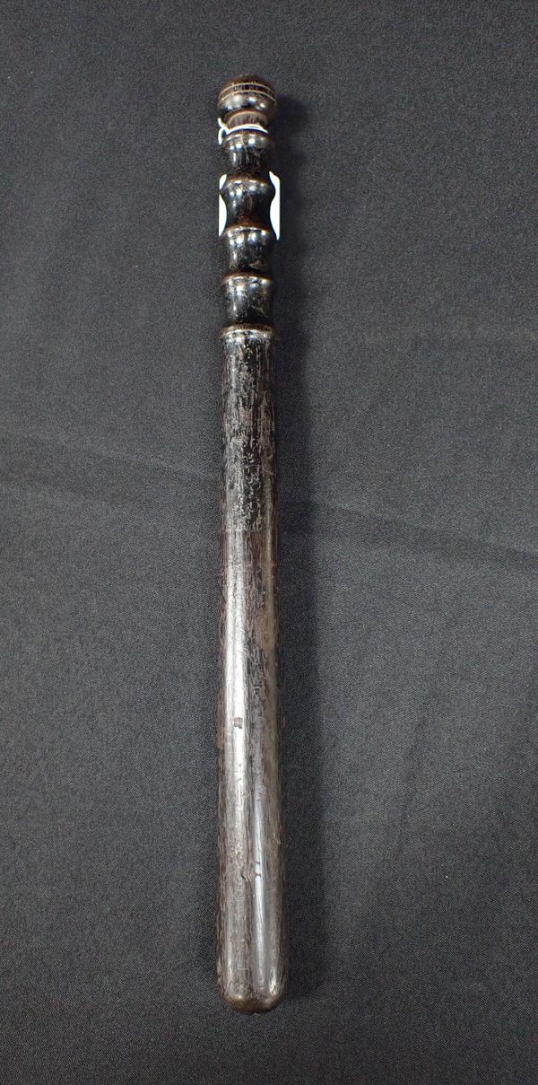 A TURNED POLICE TRUNCHEON