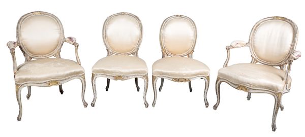 A SUITE OF GEORGE III STYLE WHITE PAINTED AND PARCEL GILT SALON CHAIRS