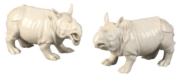 A PAIR OF MEISSEN PORCELAIN RHINOCEROS