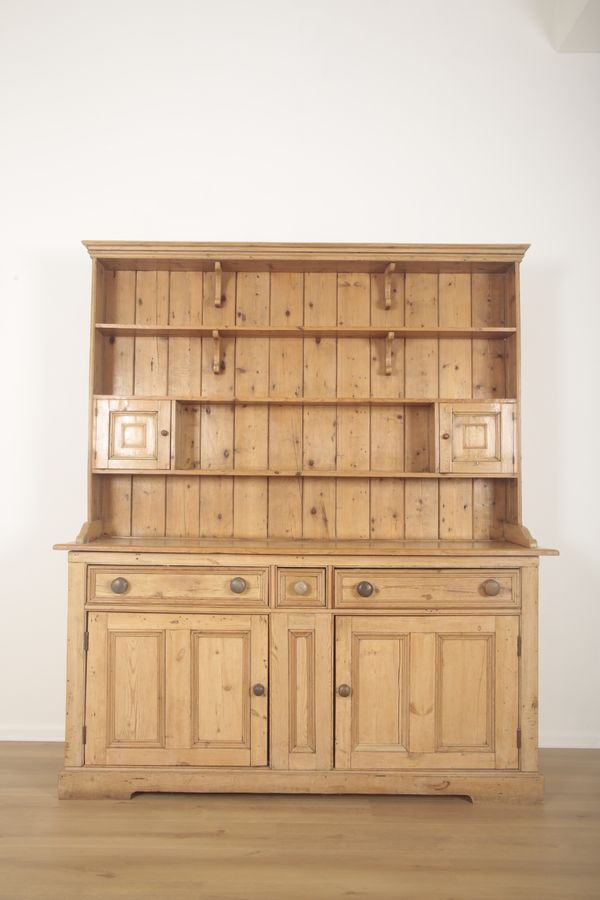 A VICTORIAN PITCH PINE DRESSER