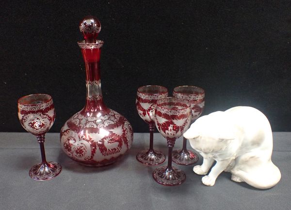 A BOHEMIAN RED FLASHED CUT GLASS AND ENGRAVED DECANTER AND FOUR GOBLETS