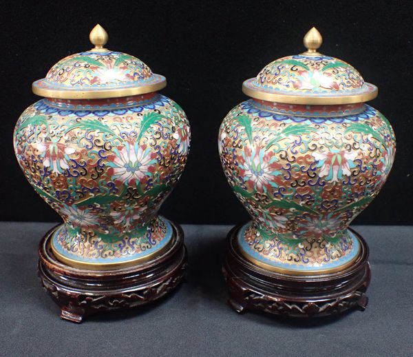 A PAIR OF CHINESE CLOISONNE COVERED JARS